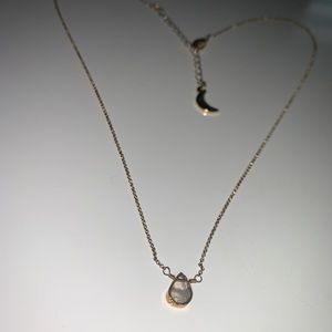 Gold necklace with gemstone